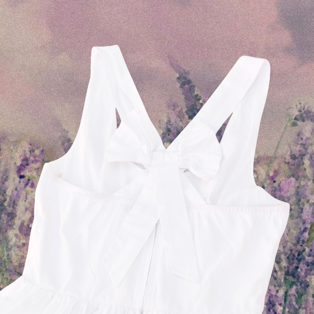 Vestido blanco con moño