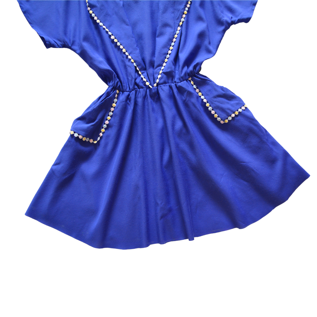 Vestido vintage con bolsas