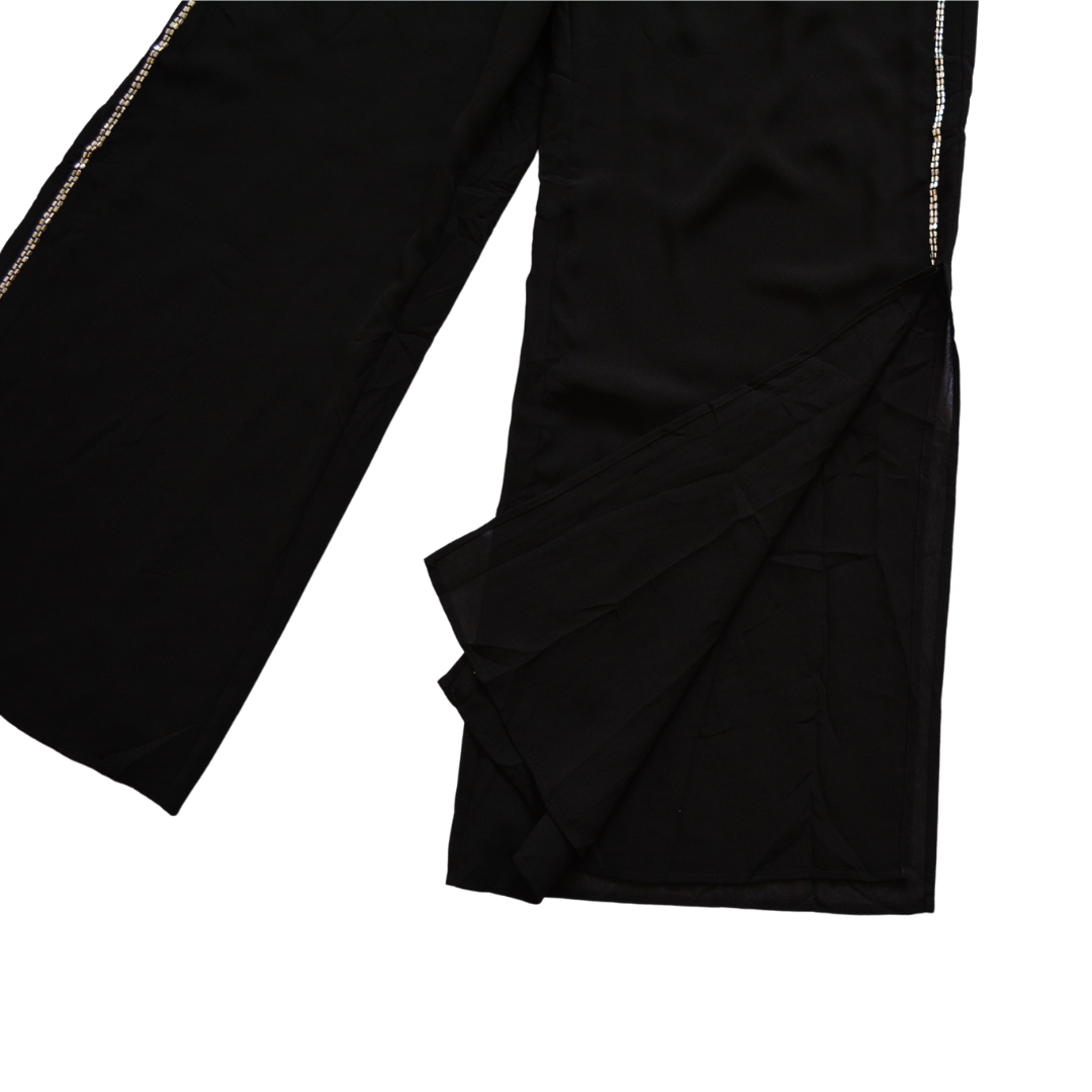 Pantalón negro de gasa con canutillo