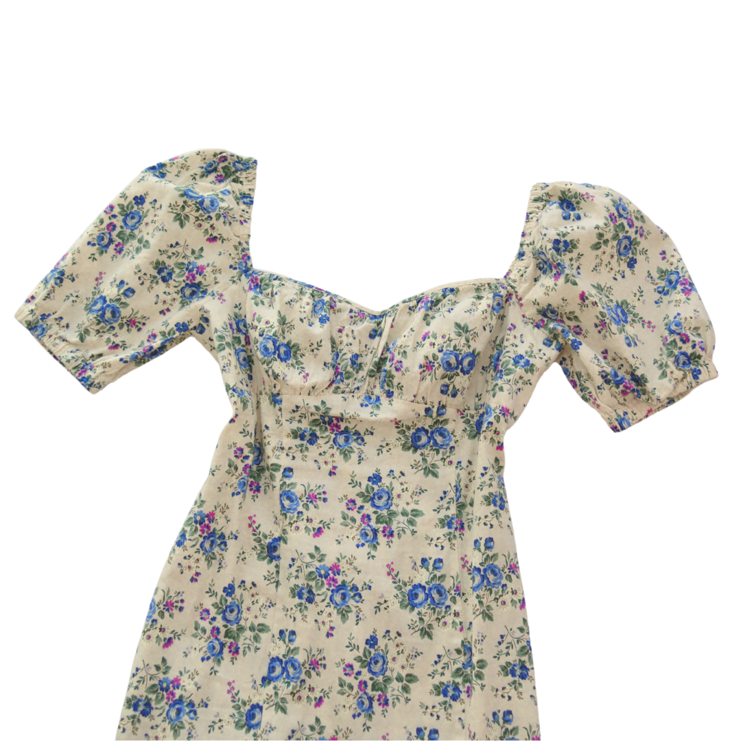 Vestido beige floral mangas globo