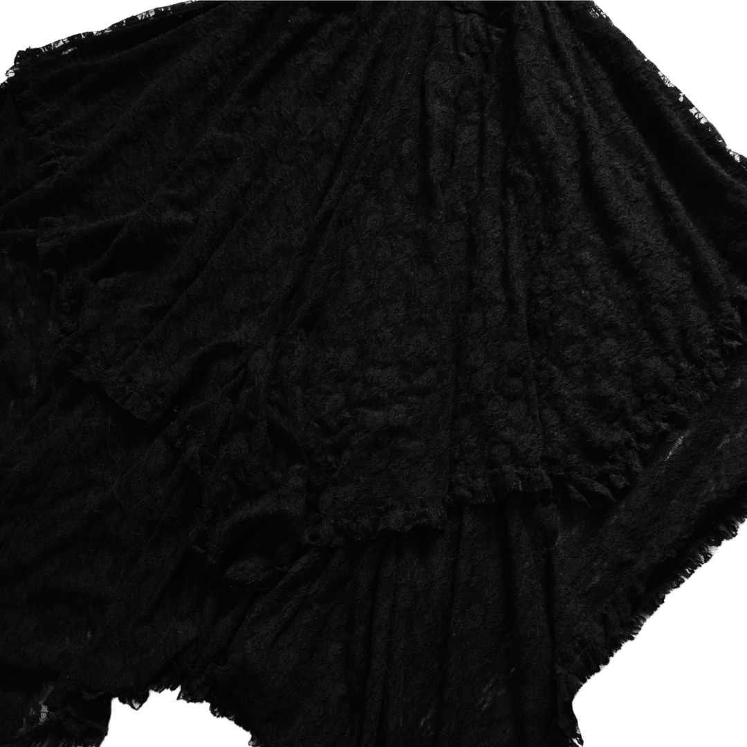 Vestido negro de encaje asimetrico