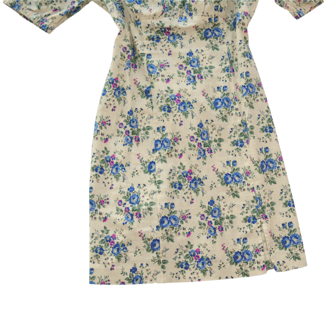Vestido beige floral mangas globo