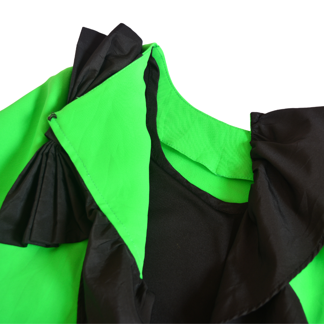 Blusa verde de seda y moño