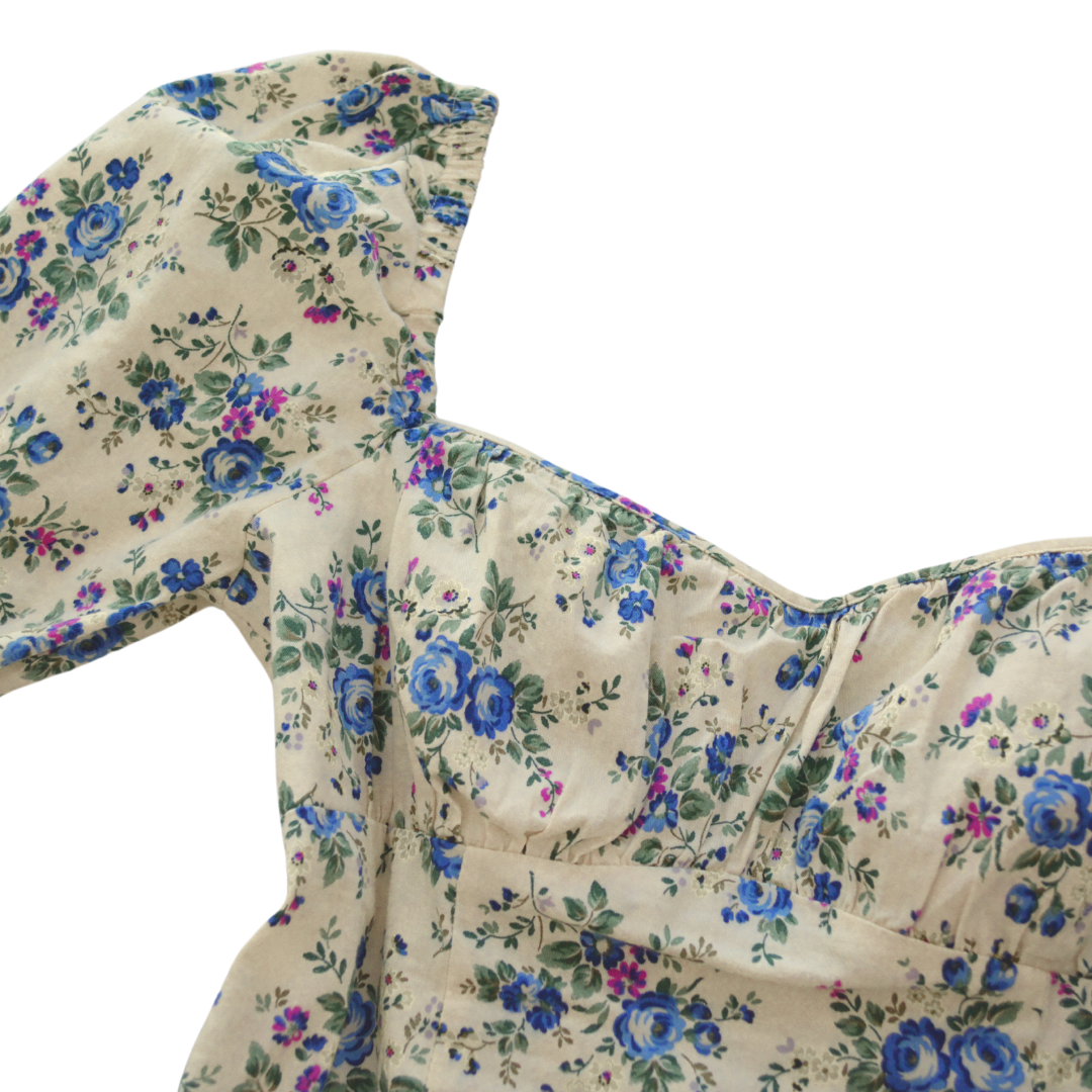 Vestido beige floral mangas globo