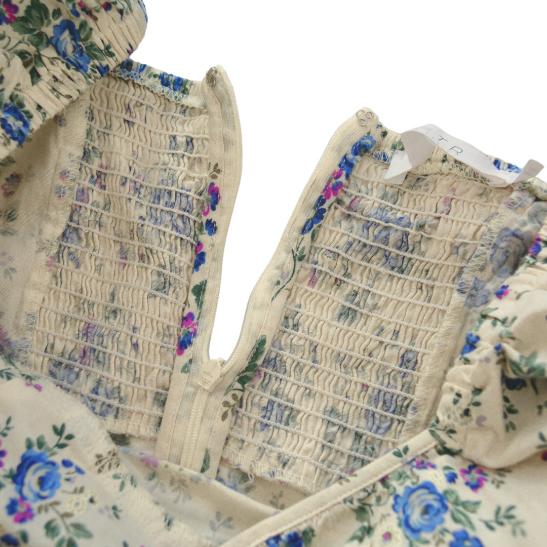 Vestido beige floral mangas globo