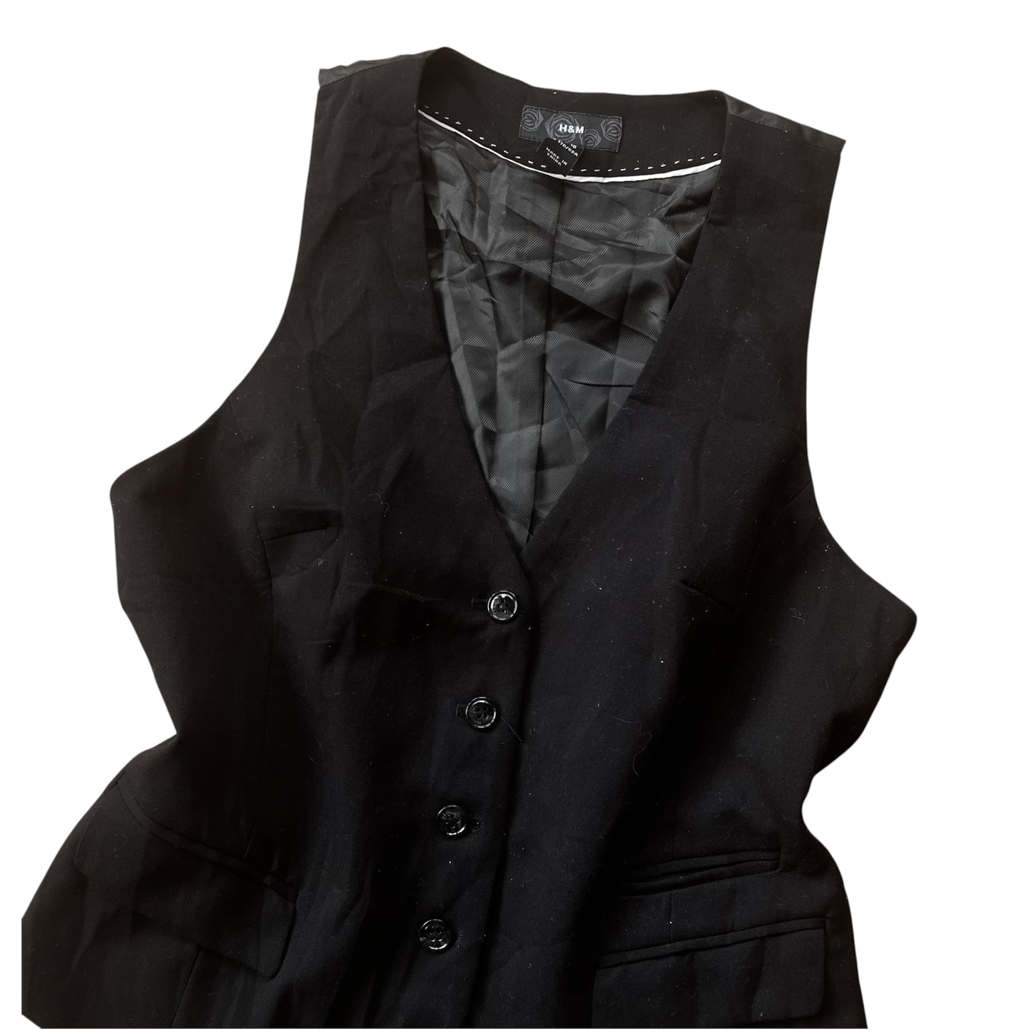 Chaleco negro botones