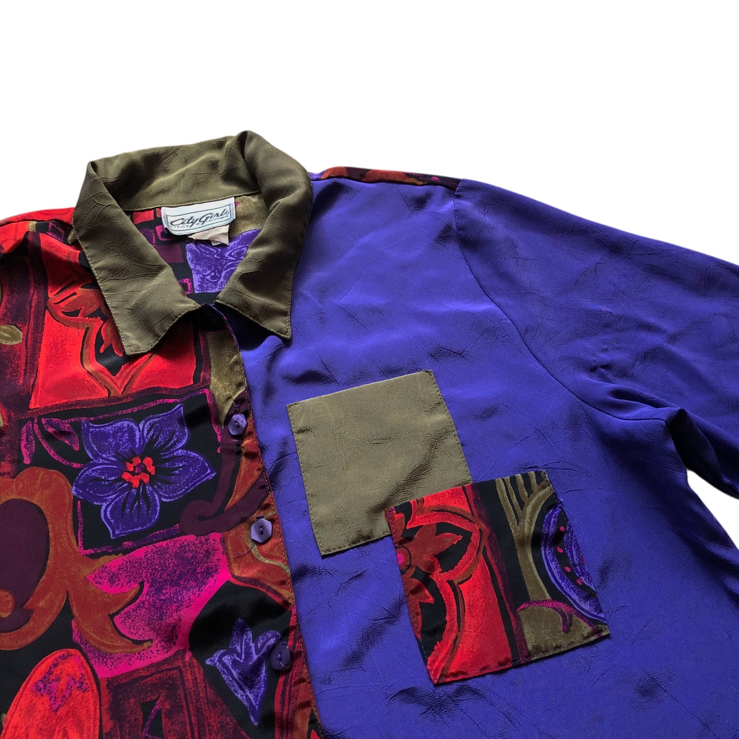 Blusa bicolor con bolsas