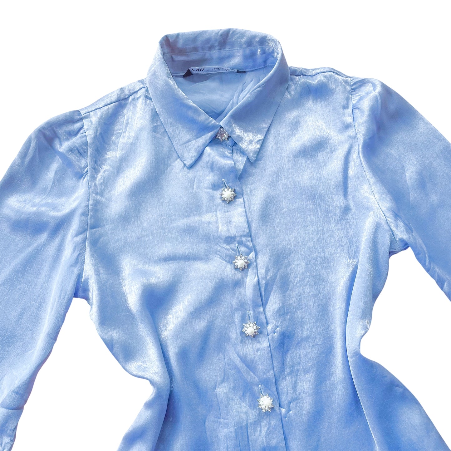Blusa azul con botones perla