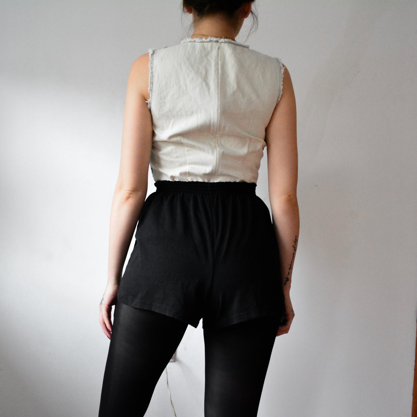 Blusa denim bicolor con nudo terciopelo