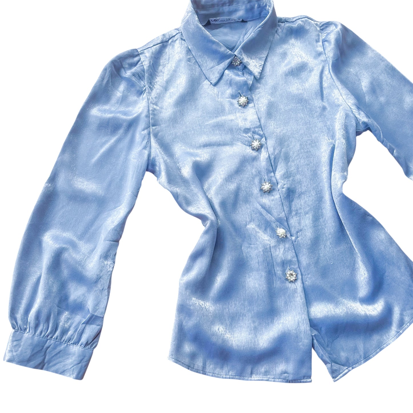 Blusa azul con botones perla