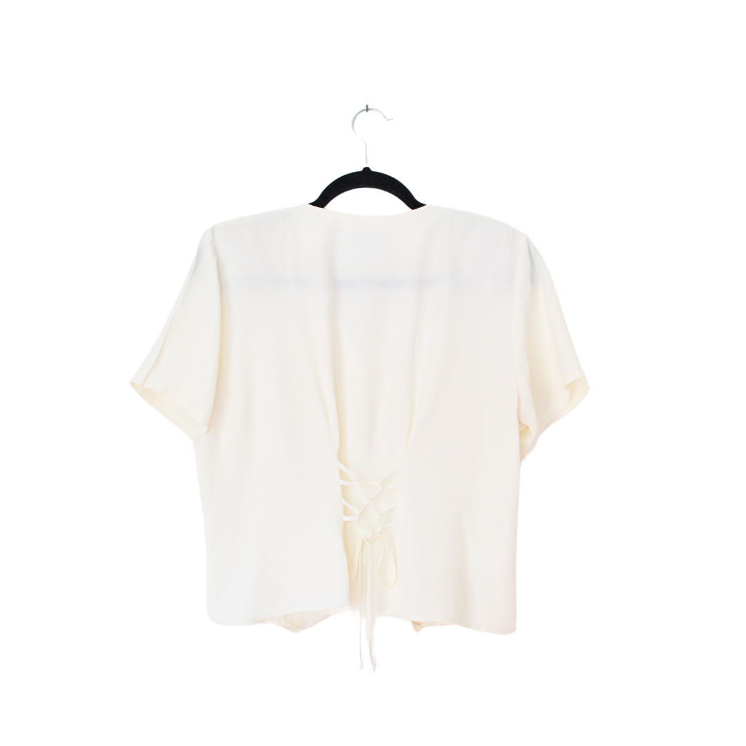 Blusa vintage beige con botones perla