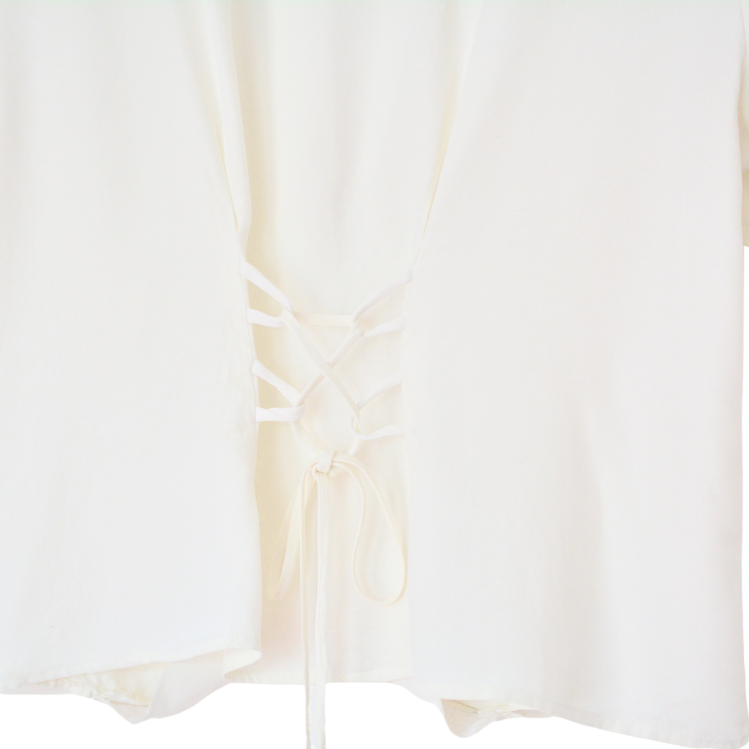 Blusa vintage beige con botones perla