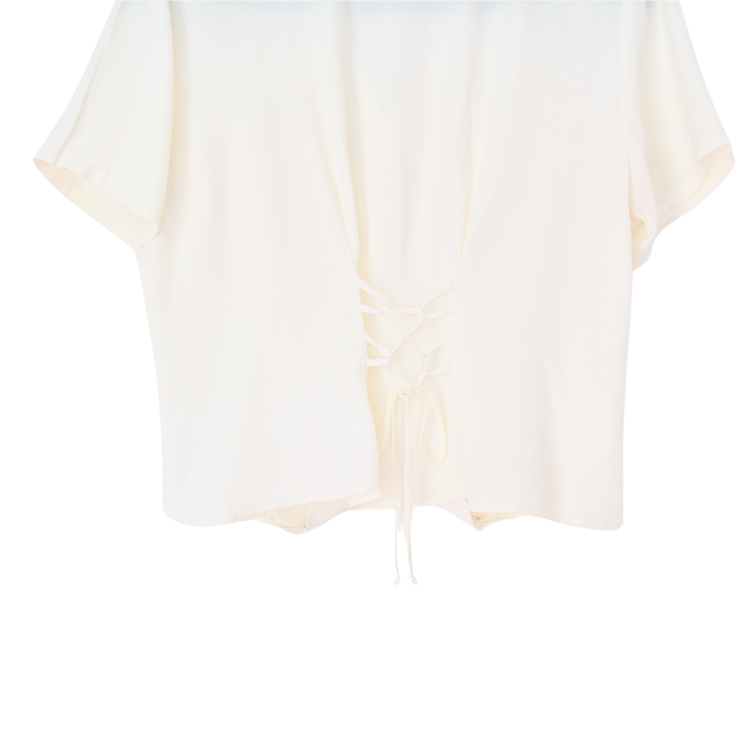 Blusa vintage beige con botones perla