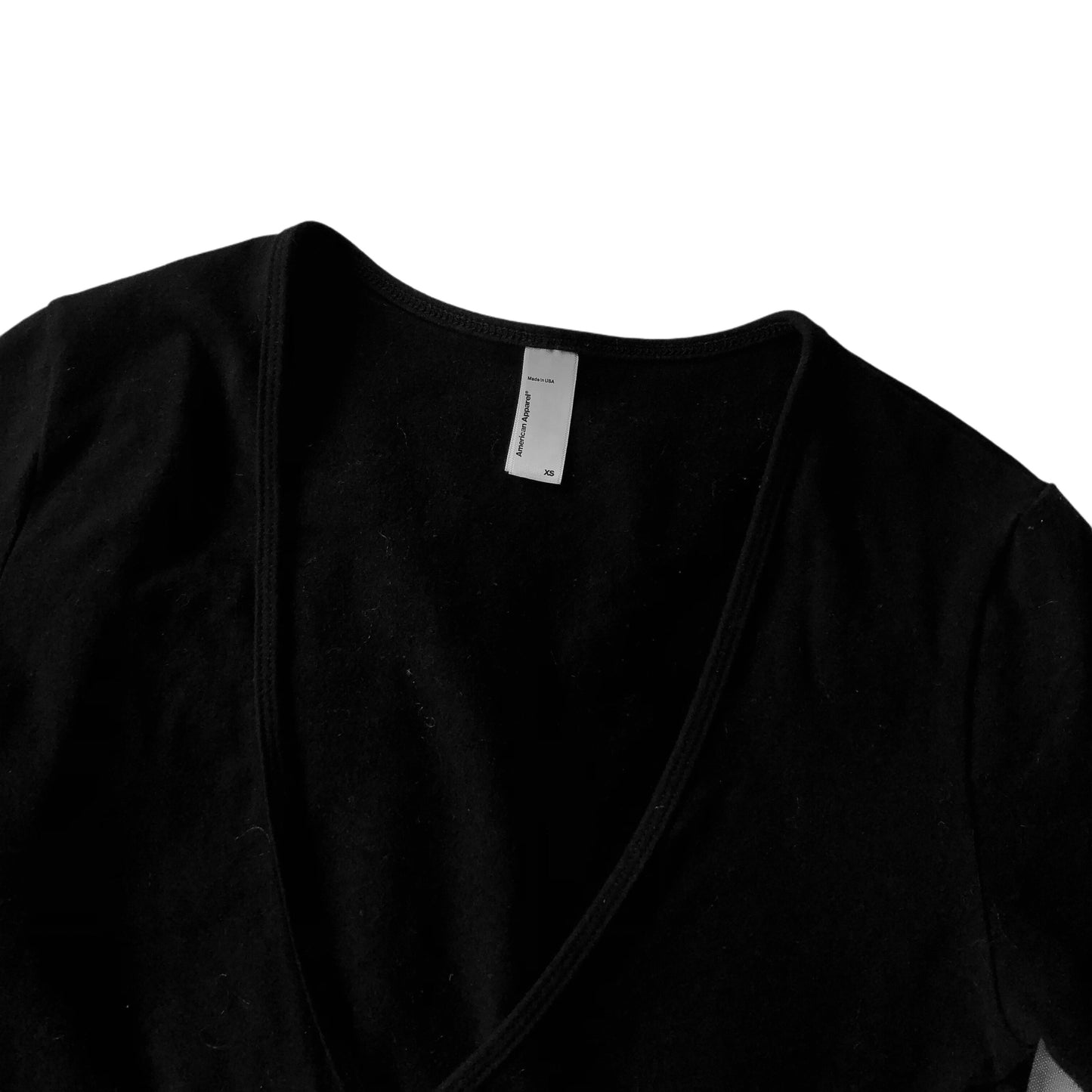 Blusa negra envolvente American Apparel