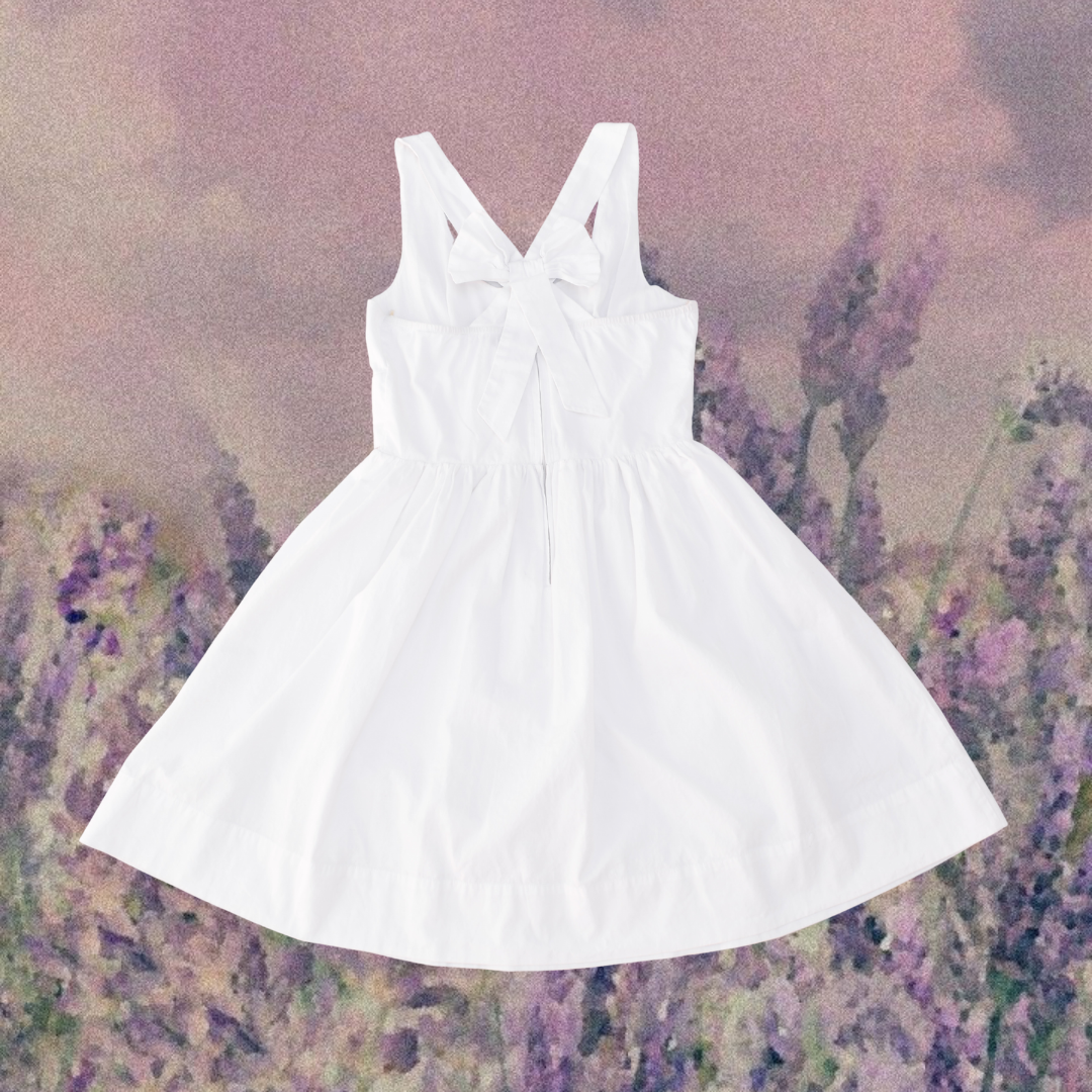 Vestido blanco con moño