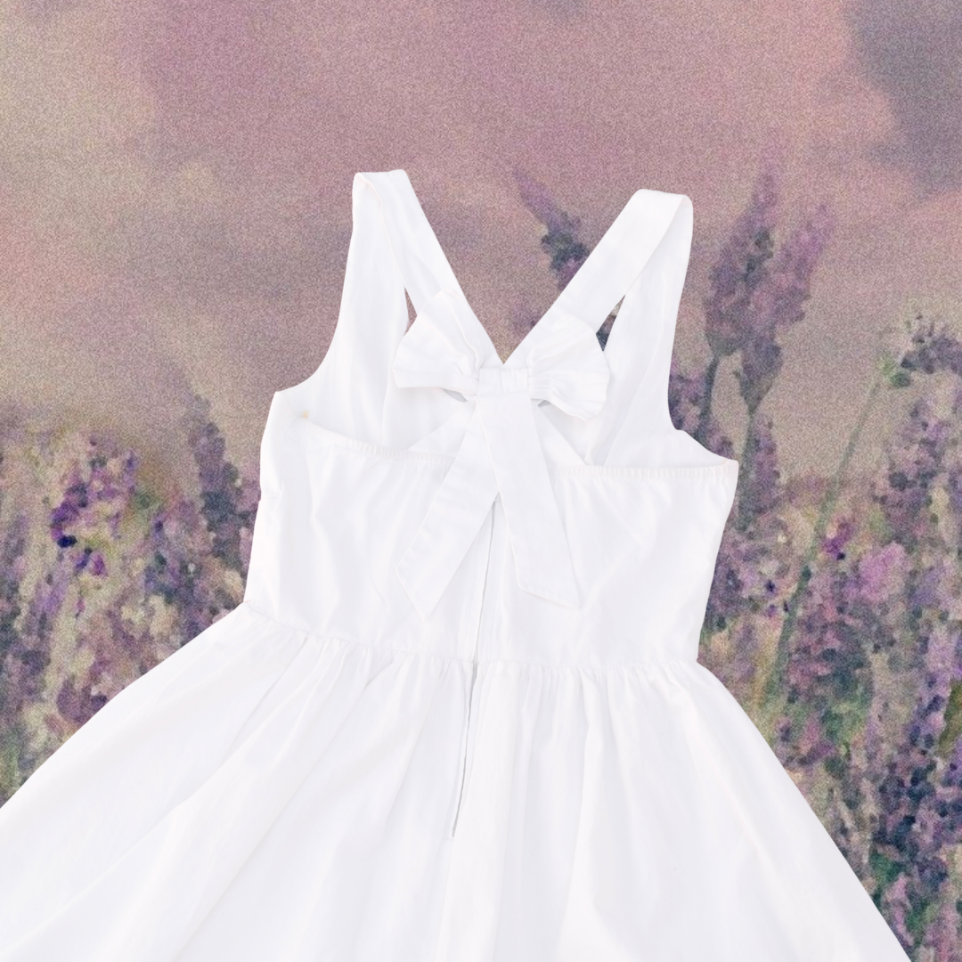 Vestido blanco con moño