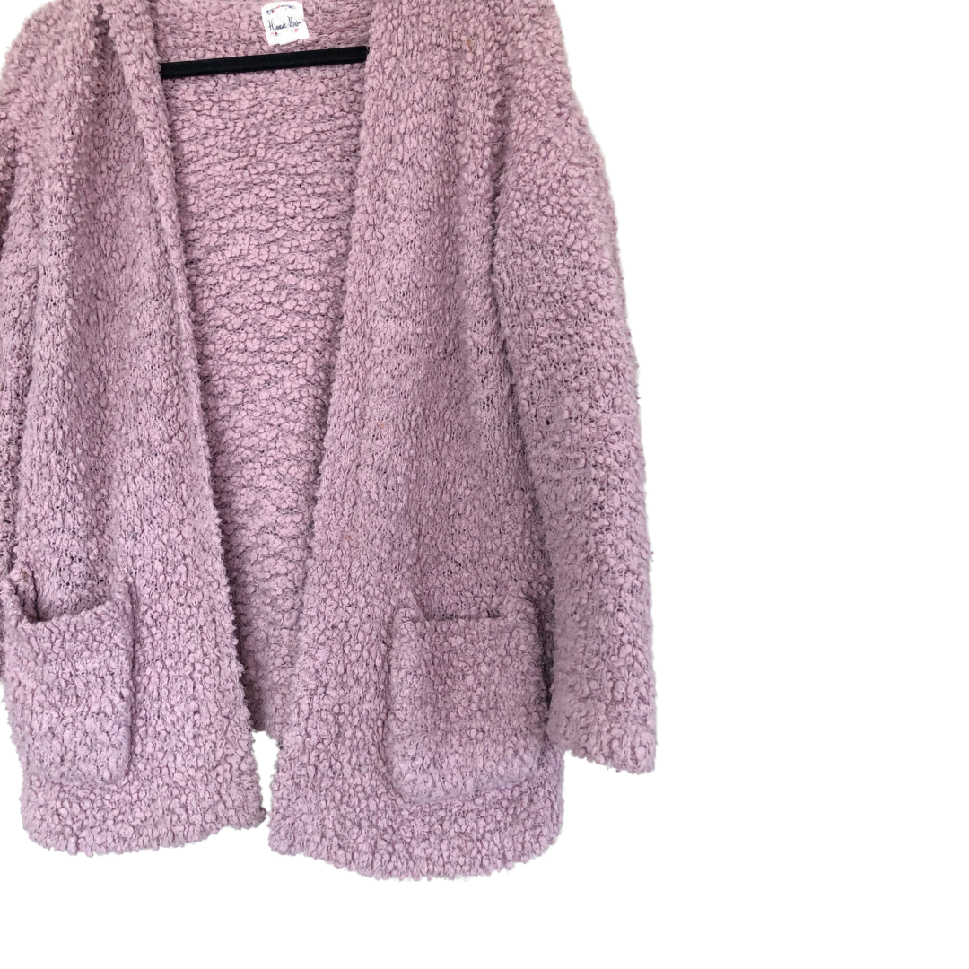Cardigan rosa con capucha
