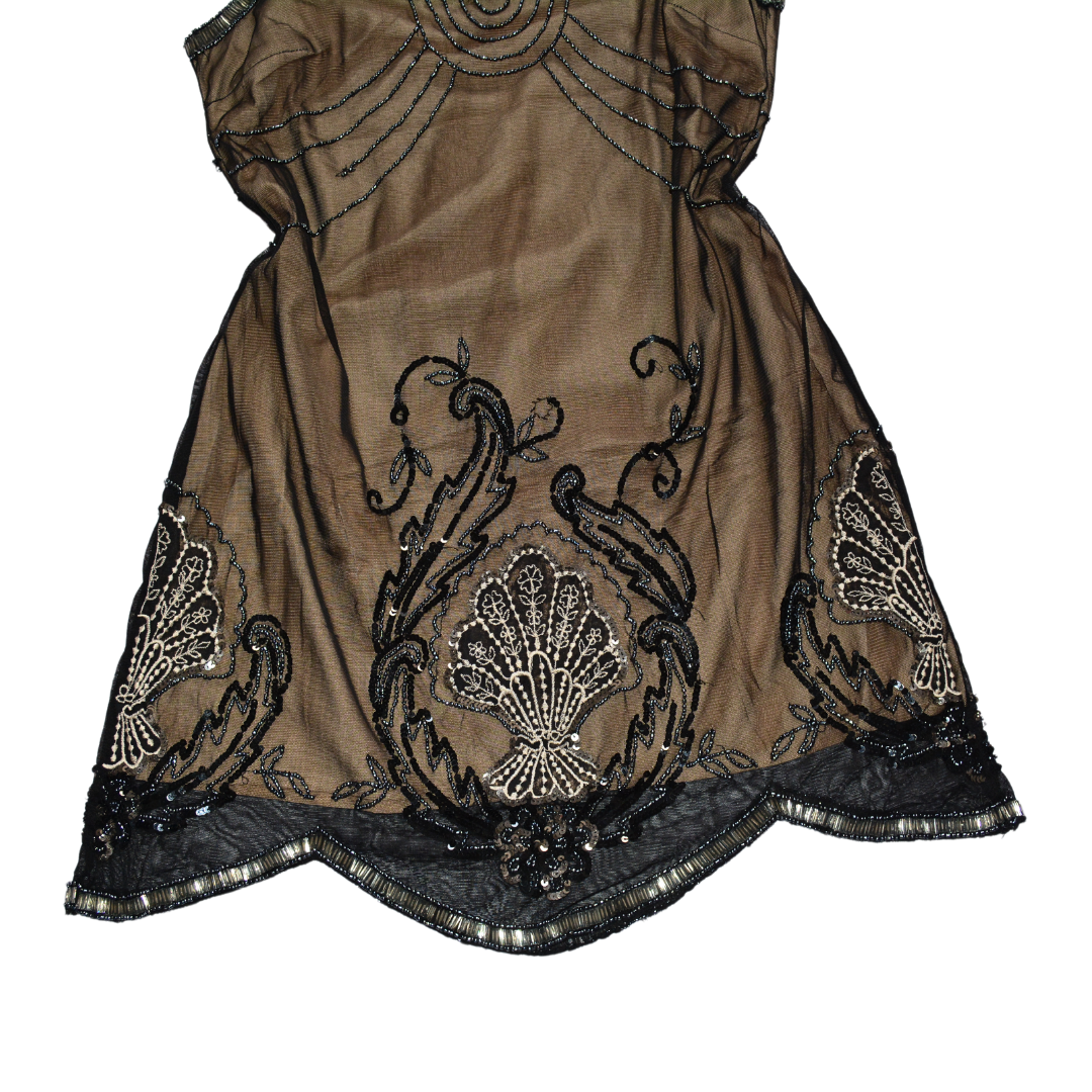 Vestido mesh con canutillo y forro nude