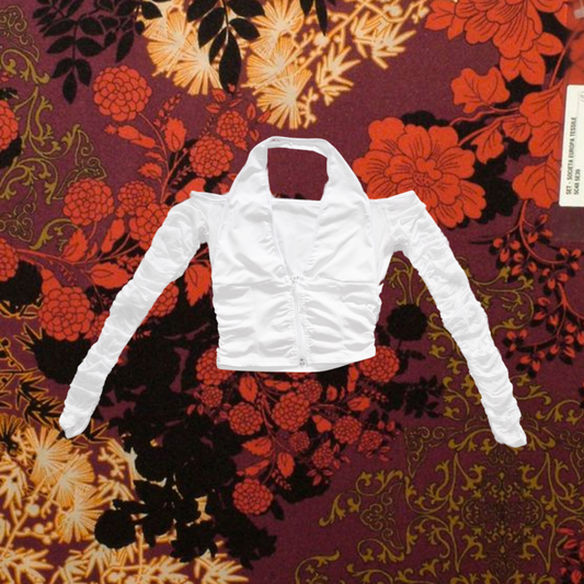 Top blanco con manguitas mesh