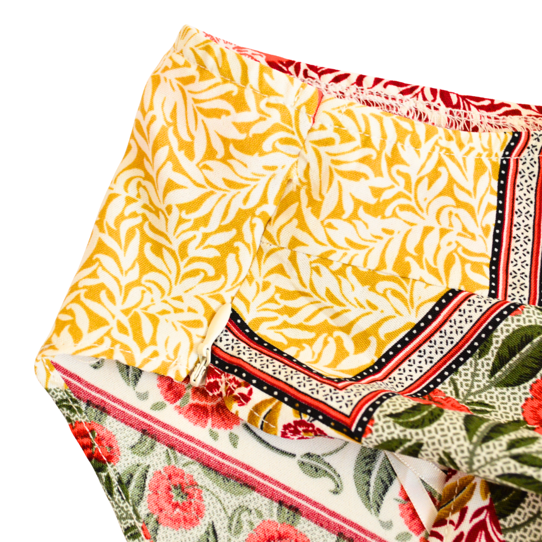 Top asimétrico floral
