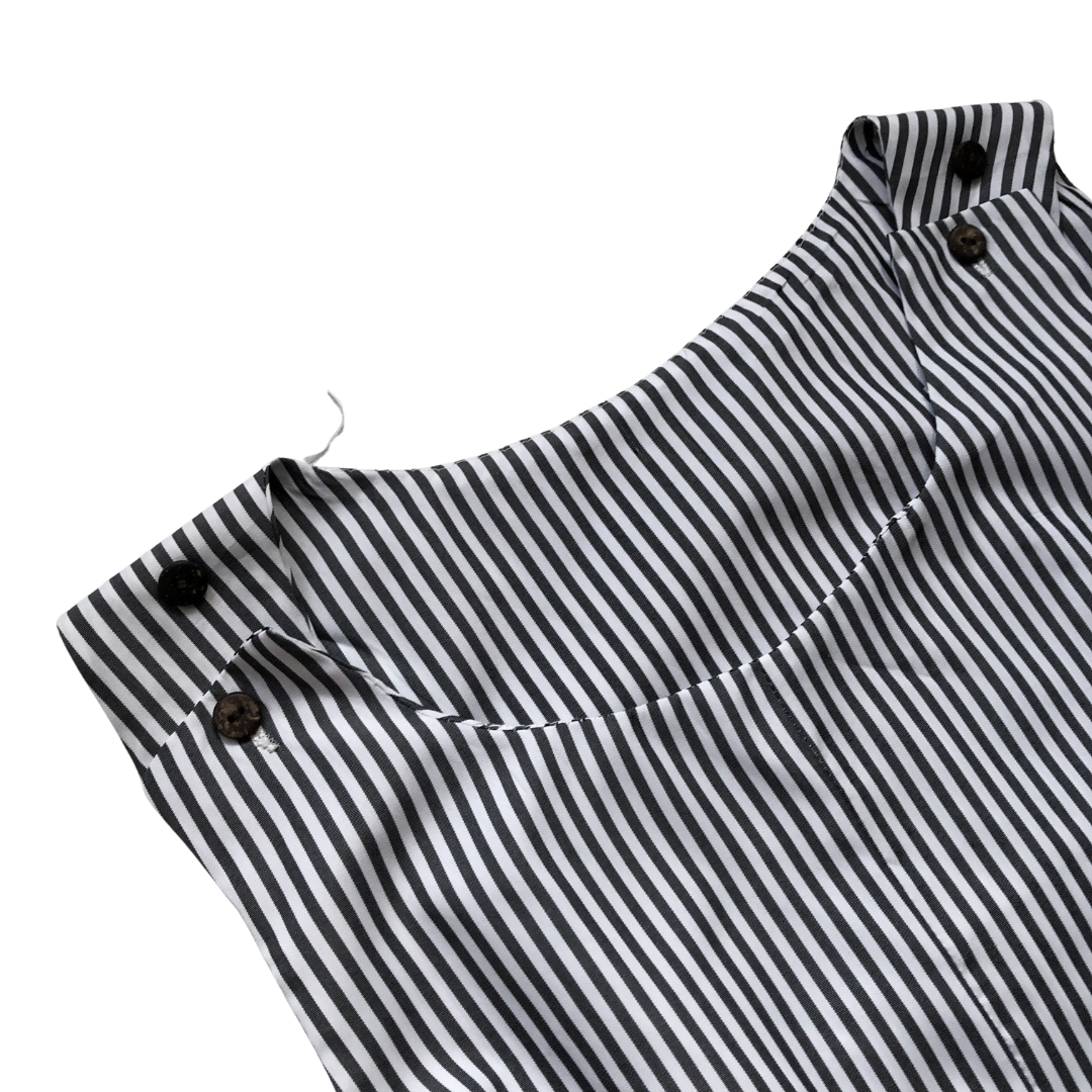 Vestido de lîneas y bolsas