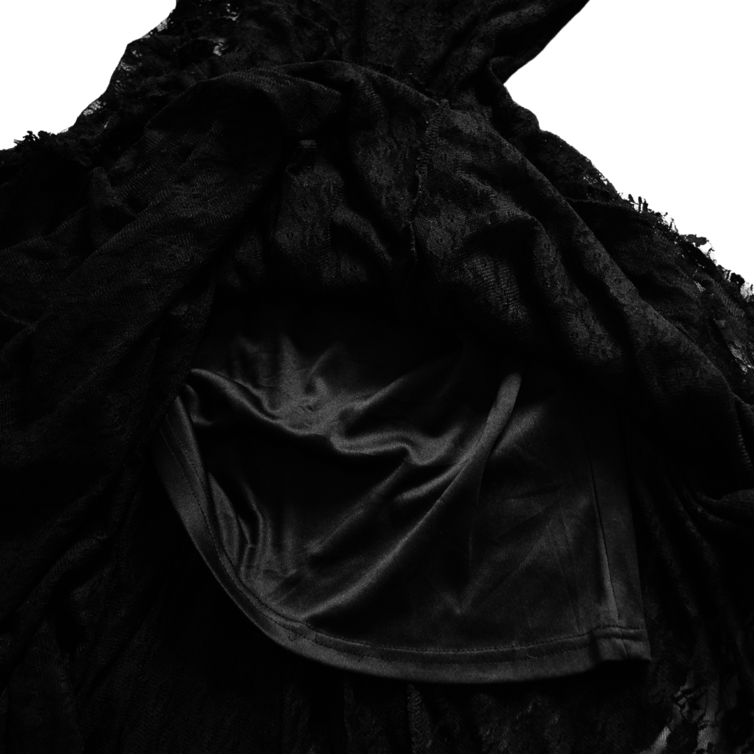 Vestido negro de encaje asimetrico