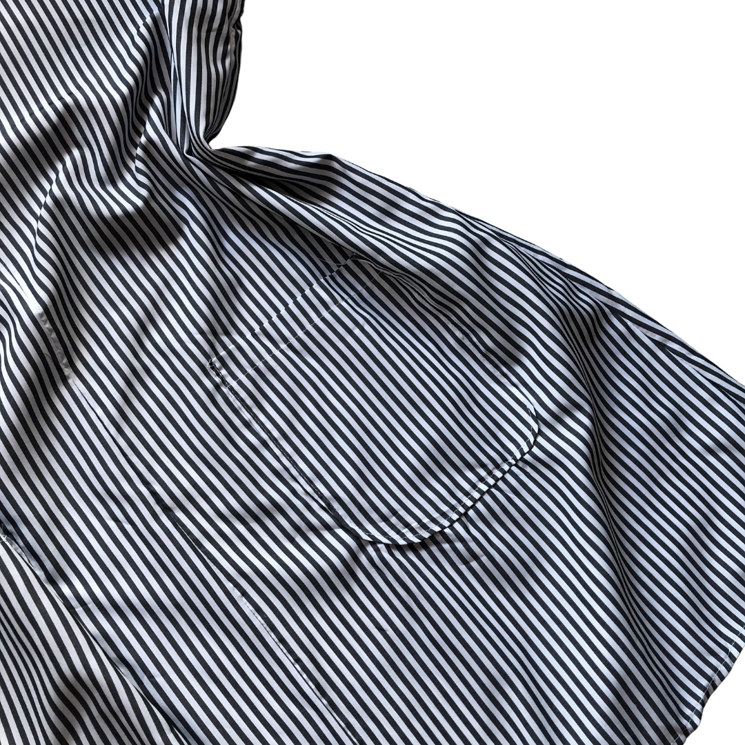 Vestido de lîneas y bolsas
