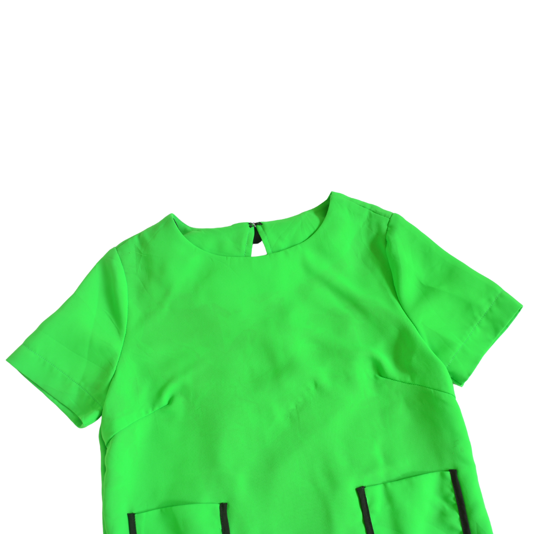 Blusa verde de seda y moño
