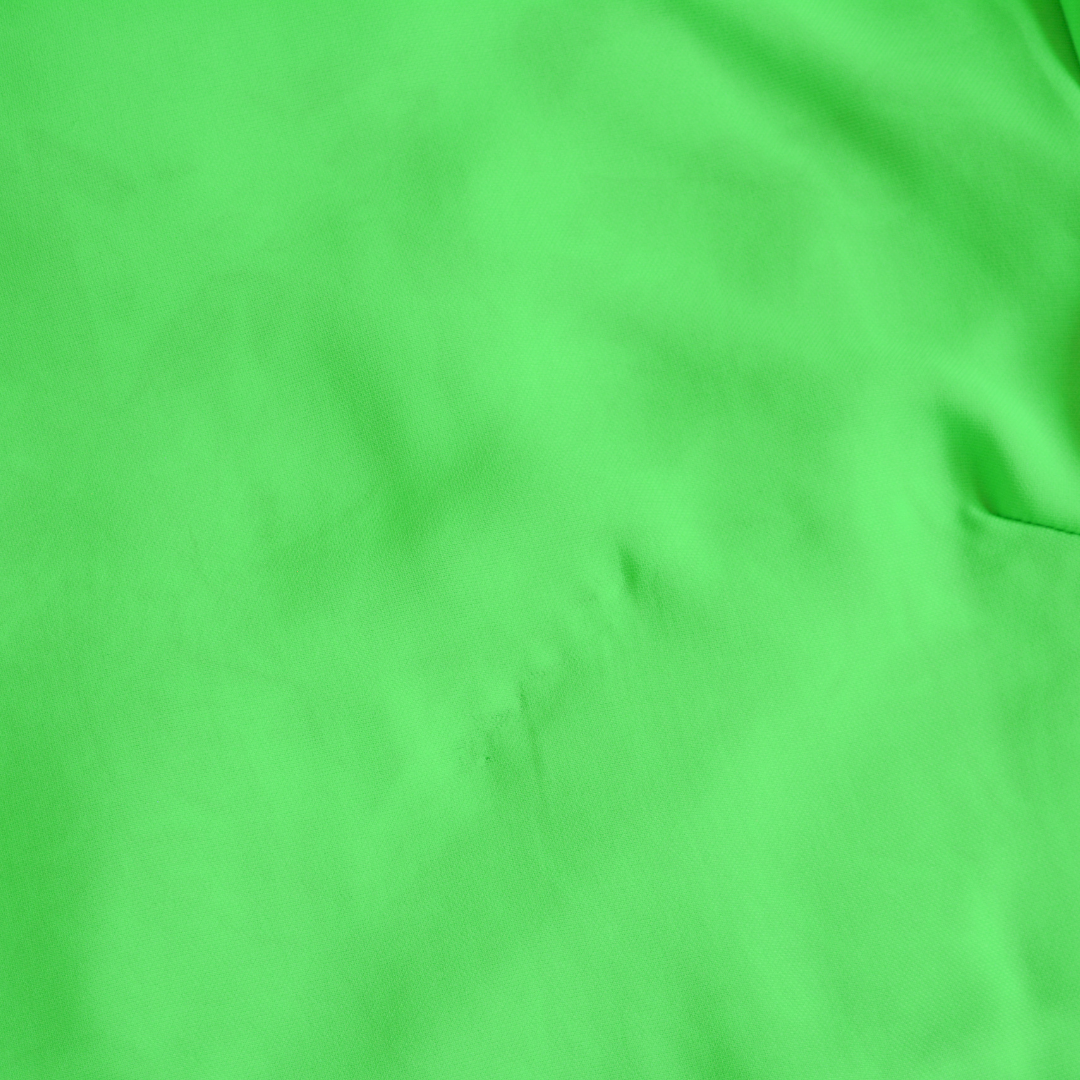 Blusa verde de seda y moño