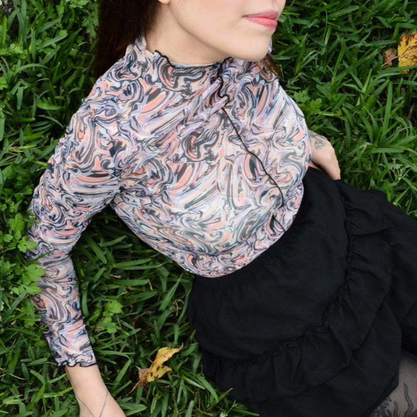 Blusa con print psicodélico