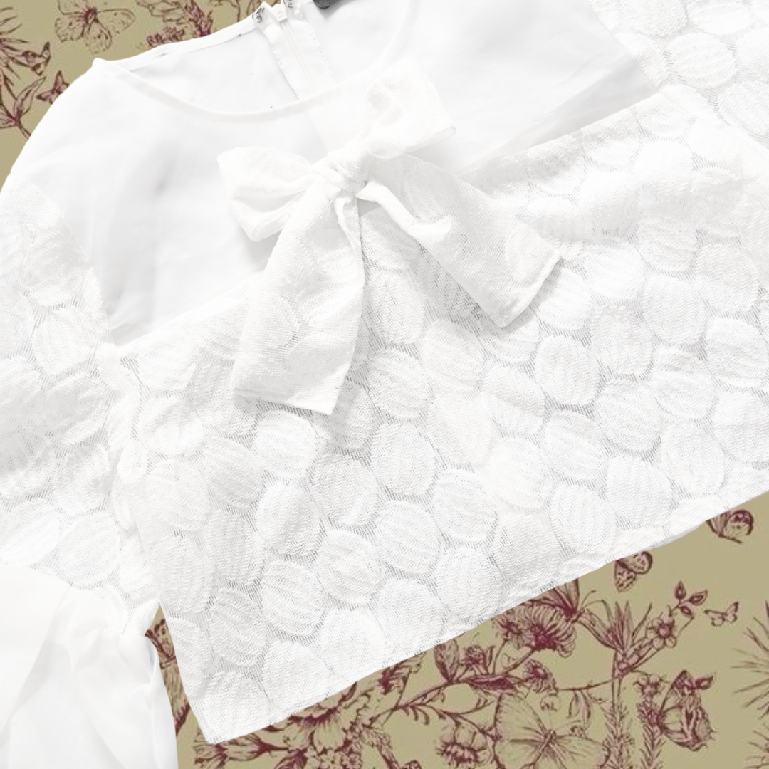 Blusa blanca con moño upcycling