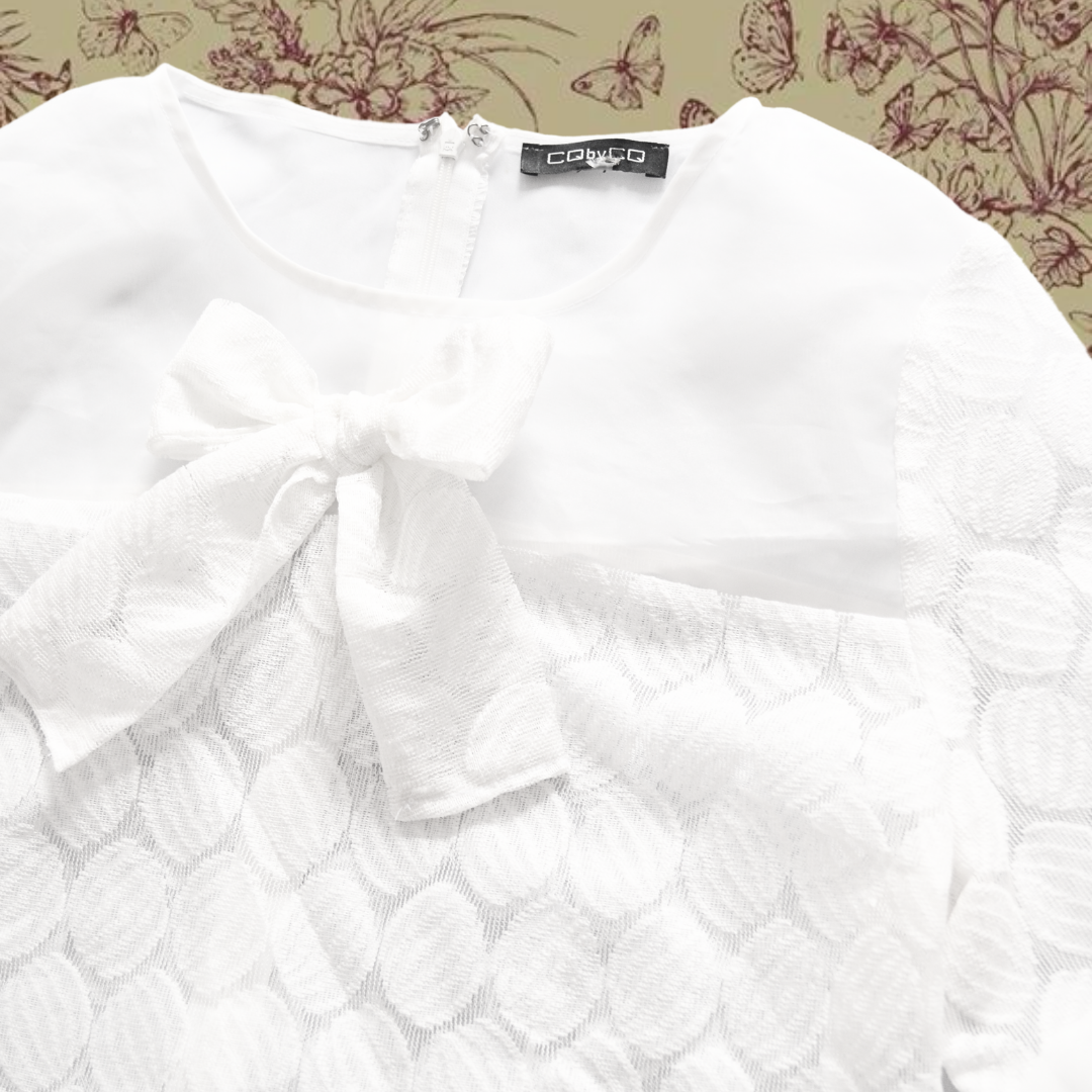 Blusa blanca con moño upcycling