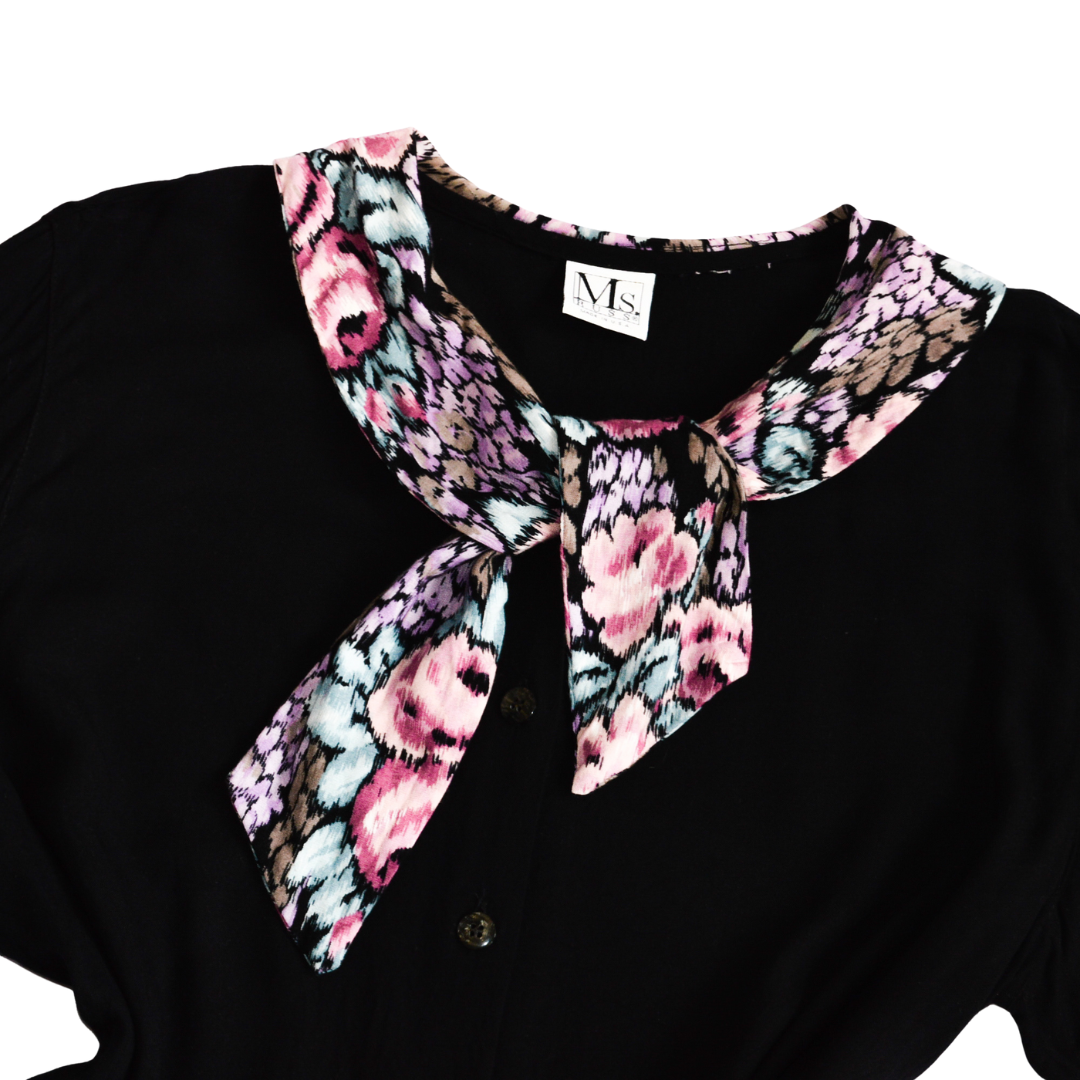 Blusa con cuello de nudo