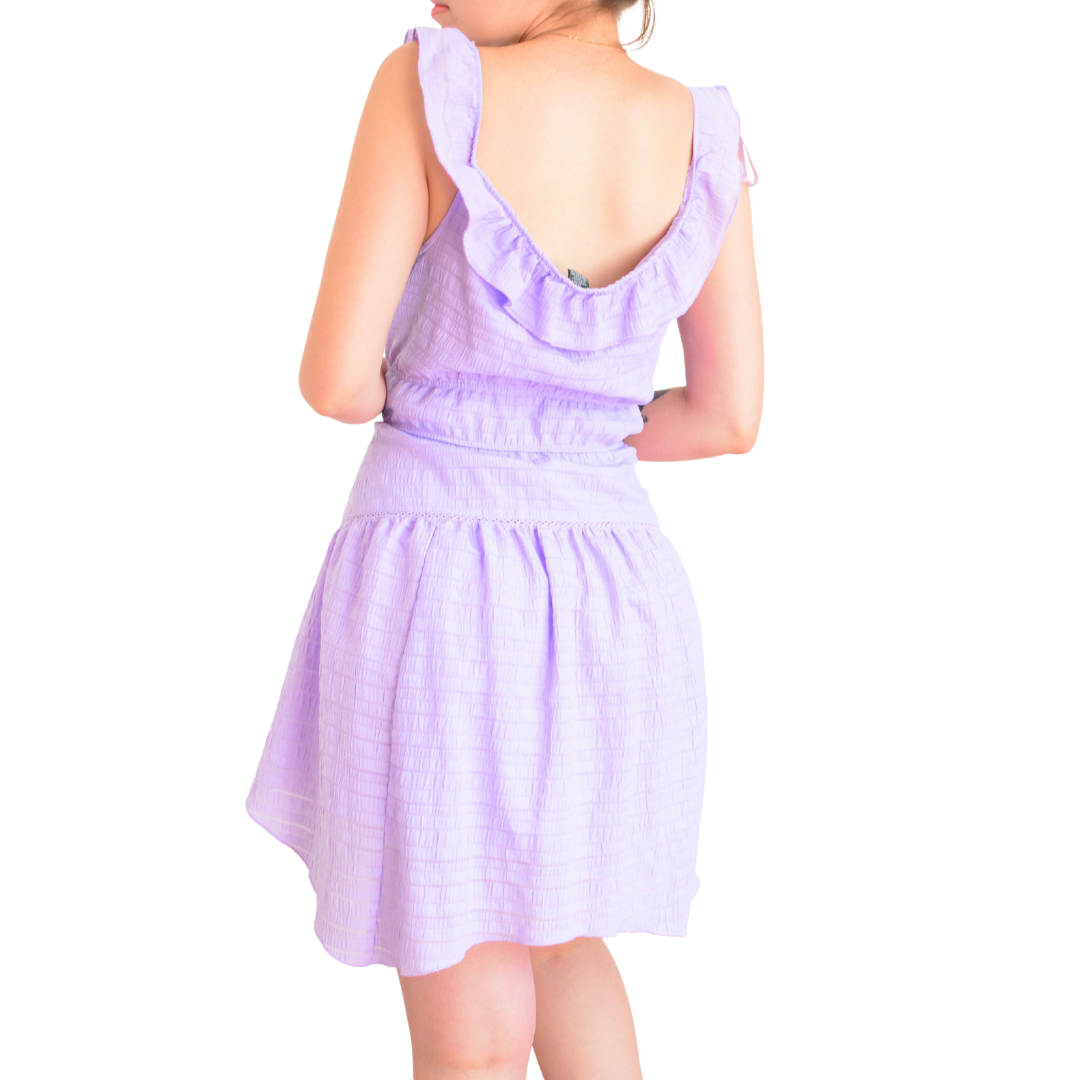 Vestido morado claro con holanes
