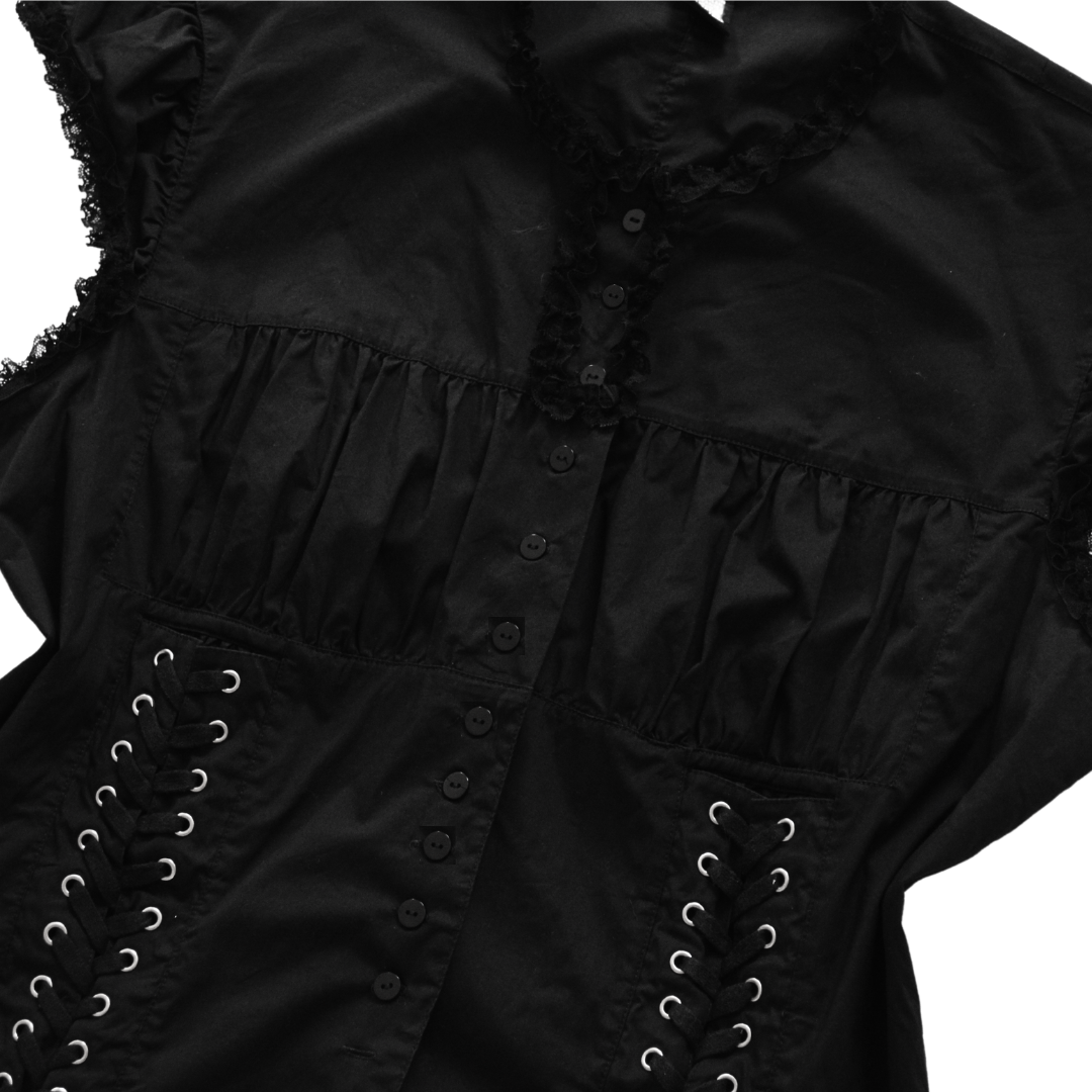 Blusa negra estilo corset