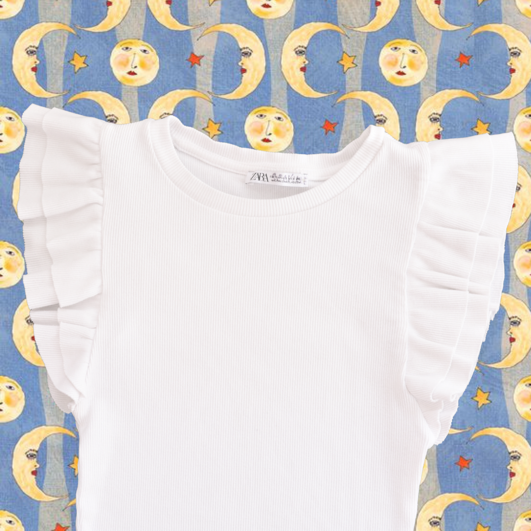 Top blanco con olanes