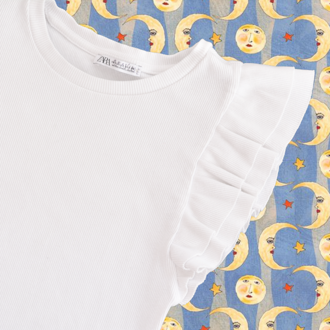 Top blanco con olanes