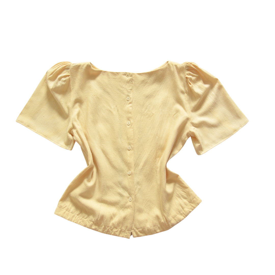 Blusa de seda y listón