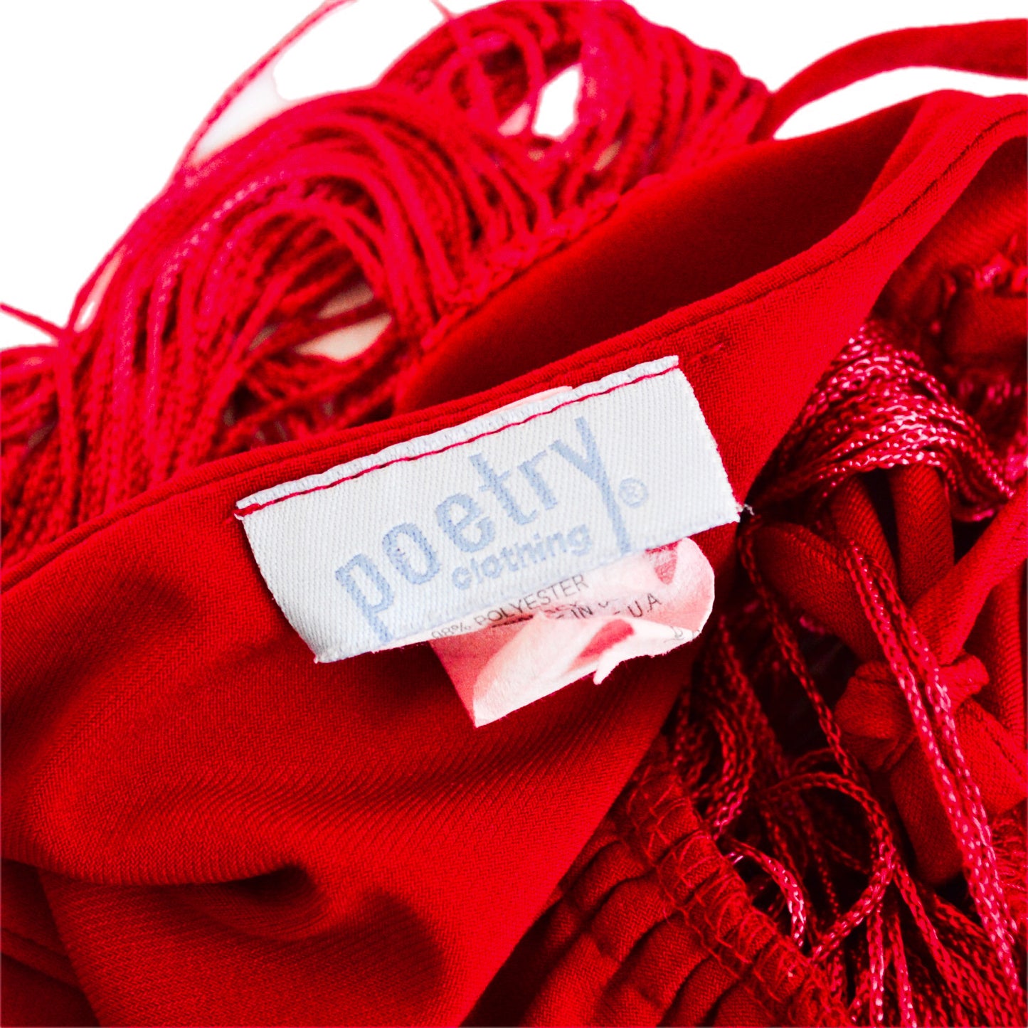 Top rojo con flequillos