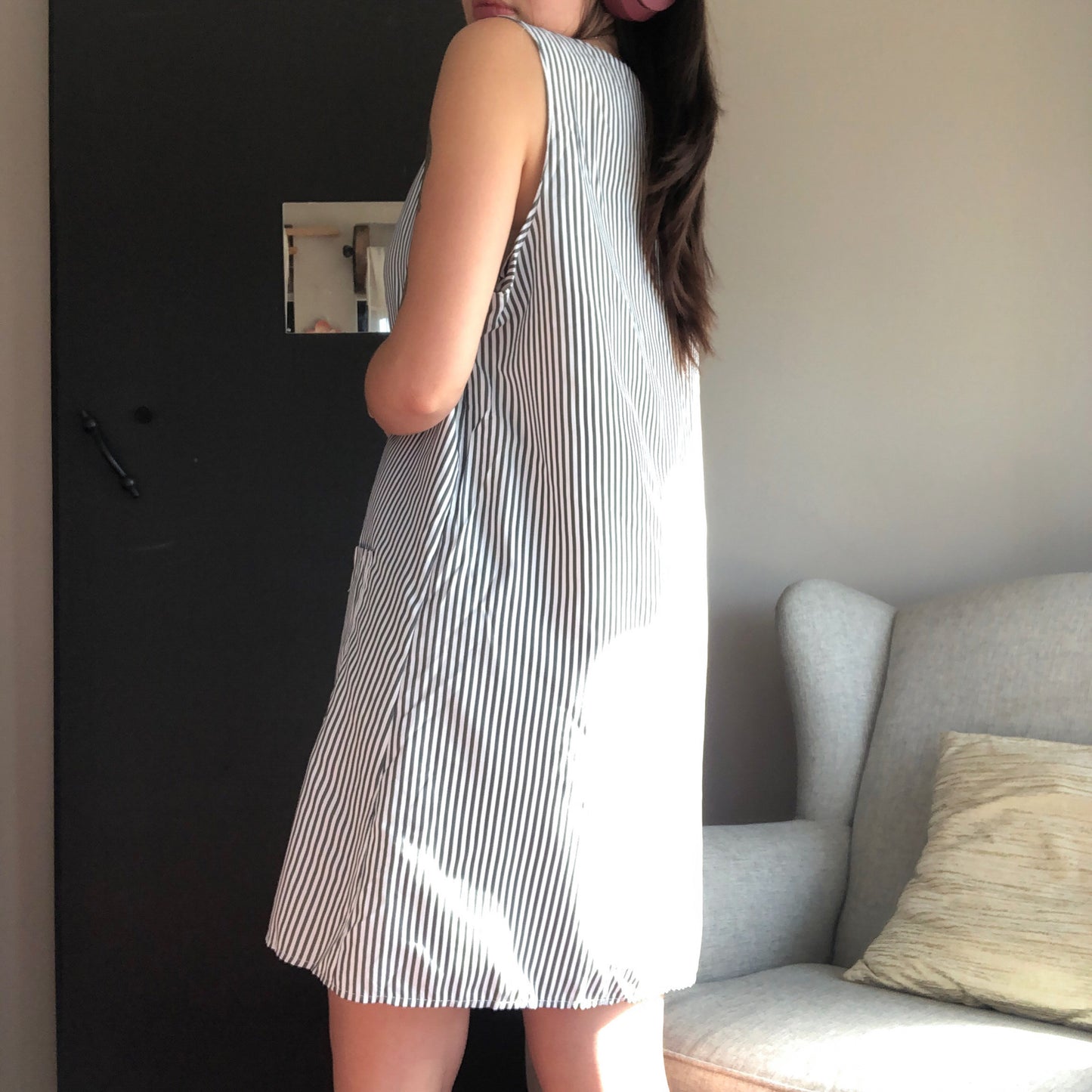 Vestido de lîneas y bolsas